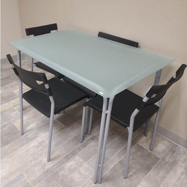 Frosted Glass Table 43 W, 30 D, 29 T and 4 Metal/ Plastic Chairs 16 W, 16 D, 30 T 