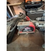 Image 4 : desk with drills, laser level, Mastercraft battery charger and contents in the desk

