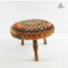 Image 3 :  Vintage Footstool Featuring A Colorful, Woven Rug-Style Top With Textured Pile And Three  Wood Legs