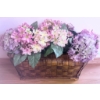 Image 7 : Decorative Home Lot Including Framed Art, Cushions, Rug, and Floral Arrangement
