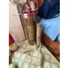 Image 1 : two antique fire extinguishers with a deer shed antler