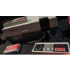 Image 2 : Nintendo Entertainment System Bundle with Controllers, Zapper, N64 Controller, Memory Card, and Duck