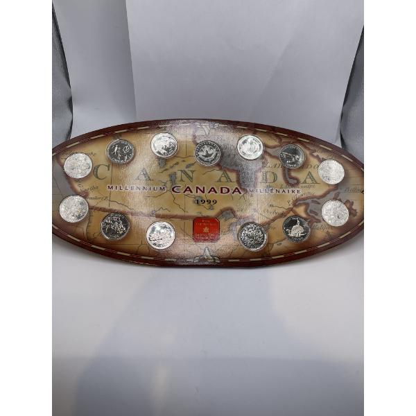 1999 12-Hole Millennium Canada 25-cent Oval Board with Coins