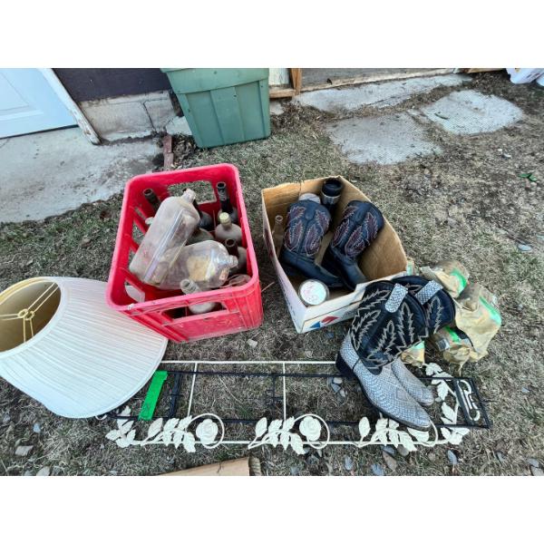 Antique bottles, lamp shades, 2 pairs of cowboy boots, plate rakes, & 4 northland greener fire logs