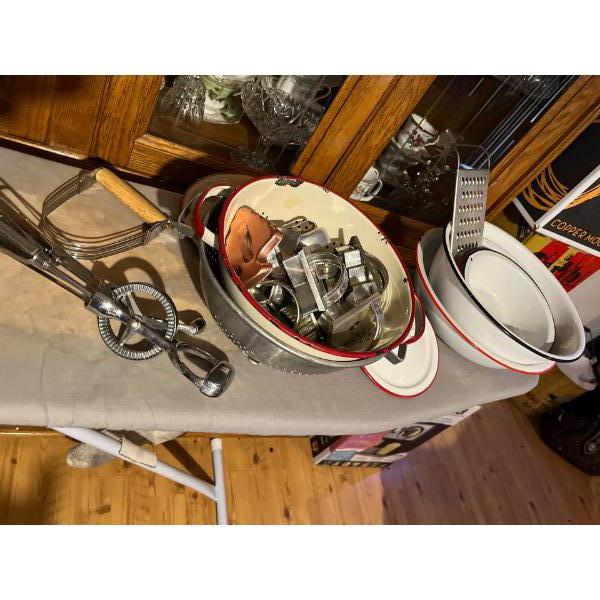 collection of enamel pots bowls with a collection of lids, vintage strainer, and vintage cookie cut