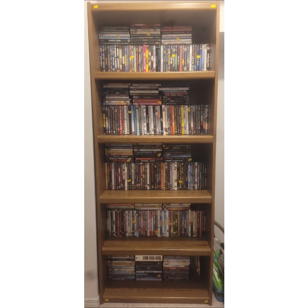 Row Of Collectible DvDs For the whole Fam Jam ( Shelf Not Included)