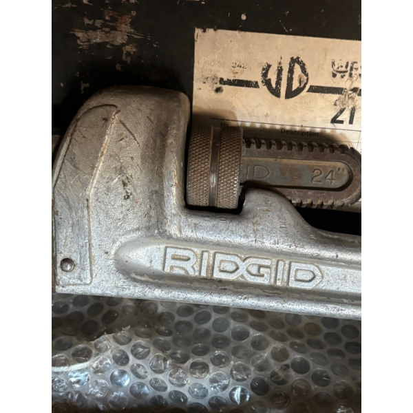 Collection of rigid, solid, steel pipe, wrenches, crow bars, and Westward 21p Drive Socket set 