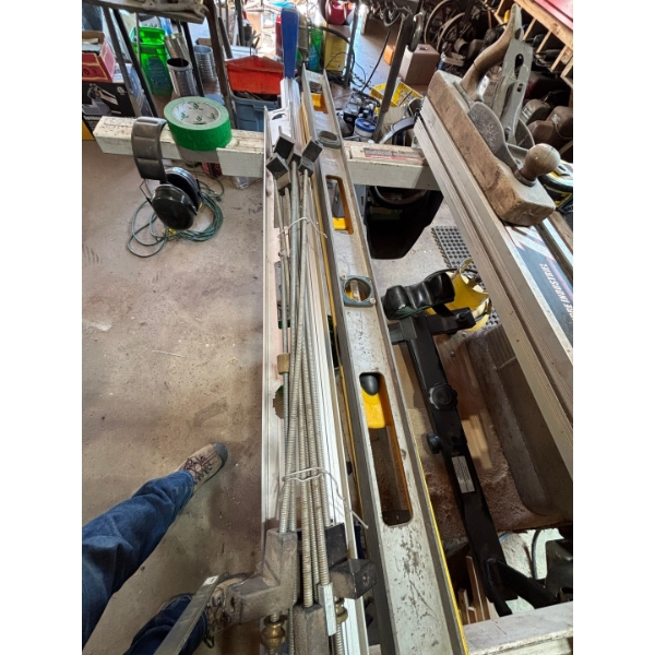 cutting guide levels and picture frame clamps vintage level is in still nice shape
