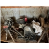 Image 4 :  Tires, lawnmower motors, jacks Bottom left shelf.