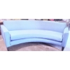 Image 1 : Curved Blue Upholstered Sofa with Tapered Wooden Legs