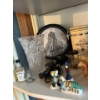 Image 5 : Shelf with contents with small collectibles .
