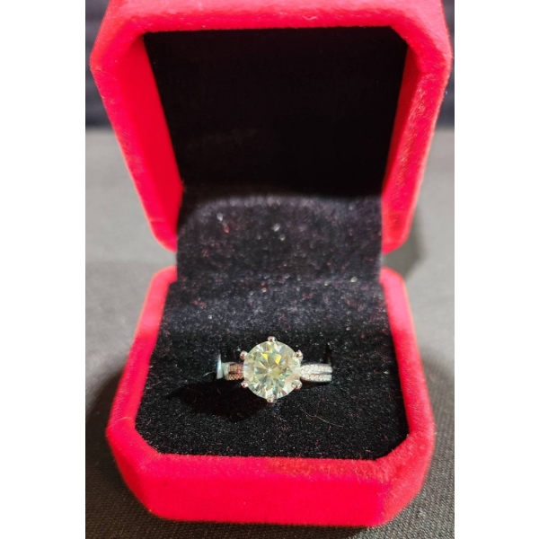 Sterling Silver Ring with 3.00 Ct Moissanite and CZ Side Stones