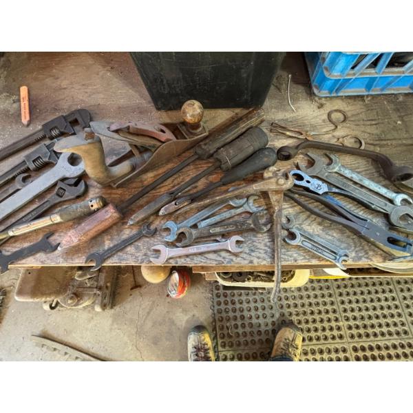 antique hand tools wrenches, planer pipe, wrenches and a number of other great items
