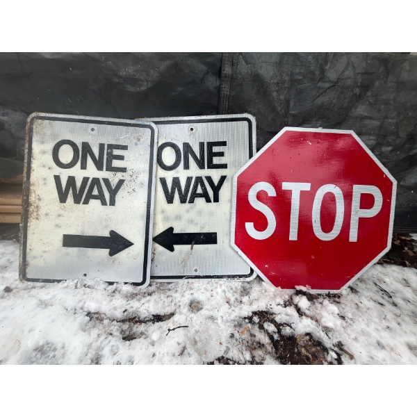 Metal road signs 2 one ways and 1 stop sign