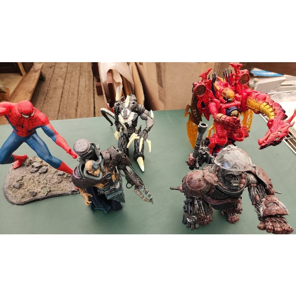 Assorted Action Figures Including Spider-Man, Venom, and Transformers