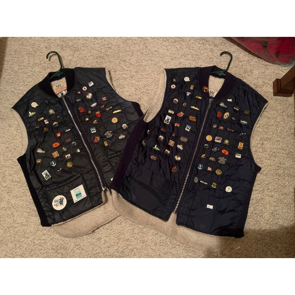 Insulated Vests Sporting An Assortment of Pins & Badges Marks Work Warehouse