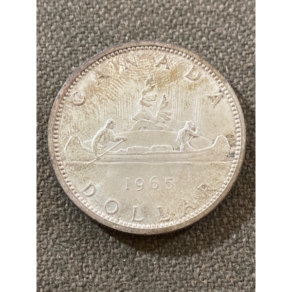 1965 Canada Silver Dollar Coin Featuring Canoe Design