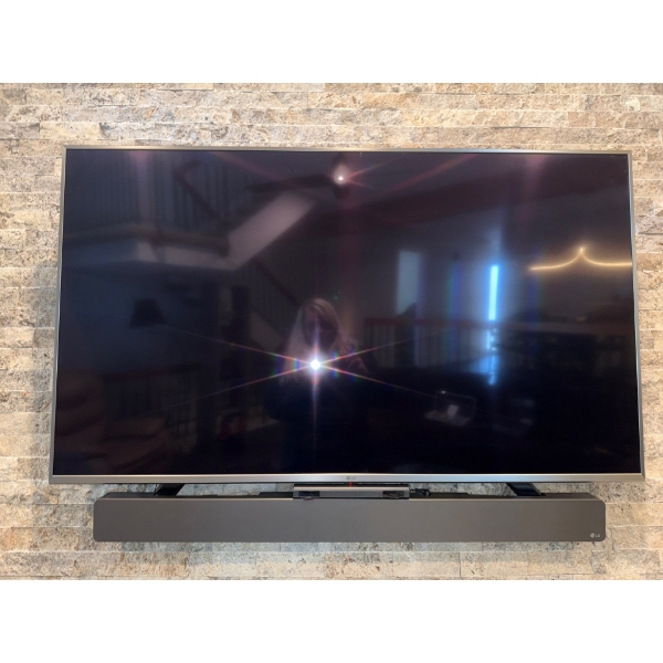 LG 55" Television Model# 55UK7700AUB Plus LG Power Bar & Base Speaker