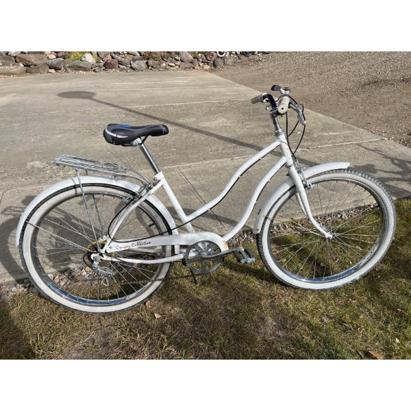 white ladies touring bike with white wall, front and back tires
