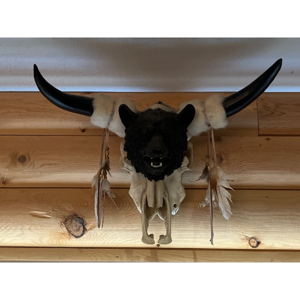 Cow Skull with horns and small bear head with feather tassels