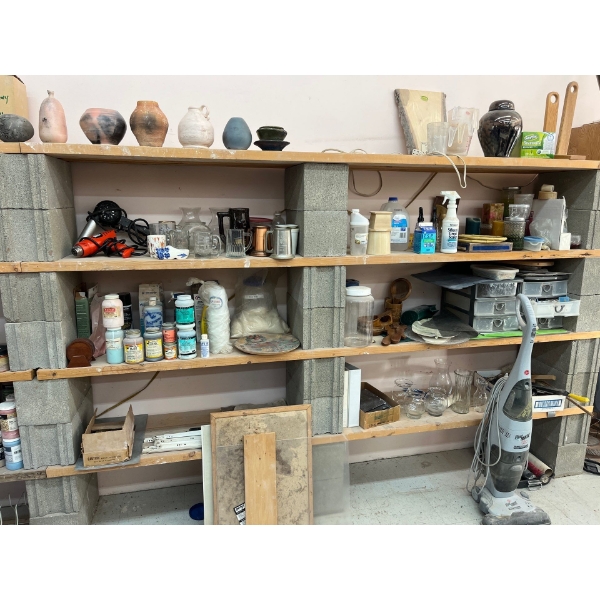 all contents on shelf, including Makita Higgins, paints vases glassware, not including shelf