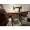 Image 1 : Raymond pedal Drive sewing Machine with beautiful wood cabinet .