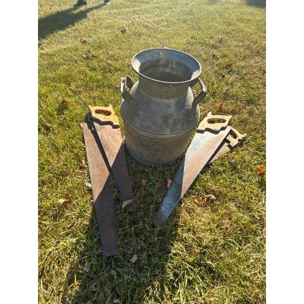  milk can and four vintage hand saws