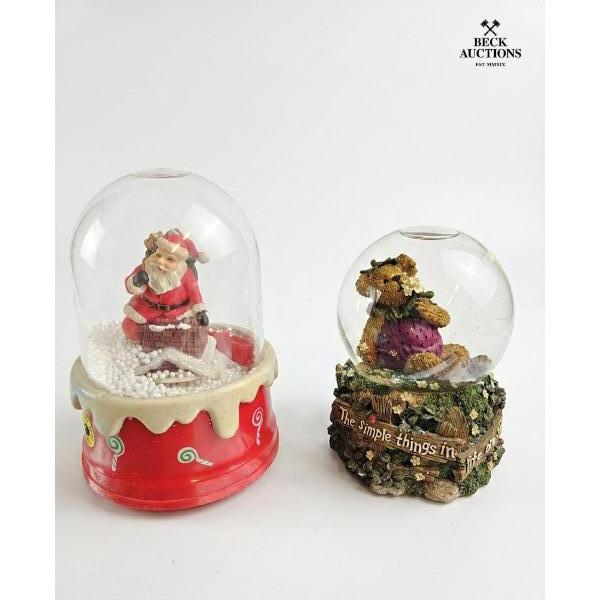 Collectible Decorative Snow Globes Featuring Holiday And Whimsical Scenes Santa Claus And Bear.