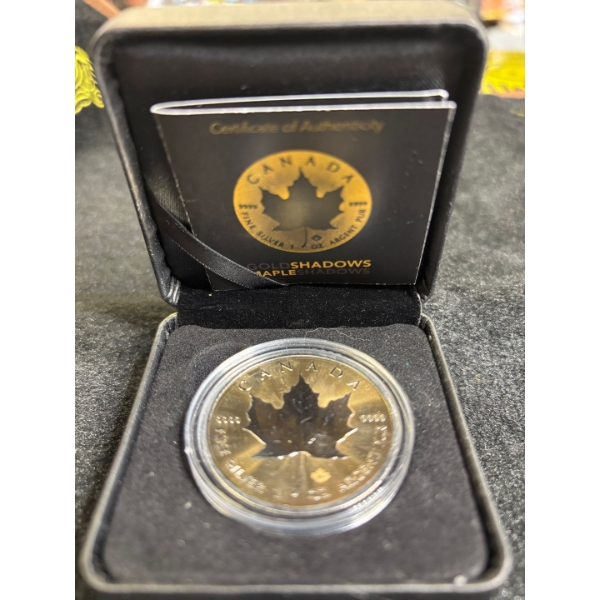 MAPLE LEAF – SHADOWS – 2016 1 OZ $5 9999 SILVER MAPLE LEAF COIN – RUTHENIUM AND 24K GOLD
Special Fea