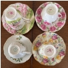 Image 2 : Four Porcelain Floral Tea Cups and Saucers with Gilded Accents