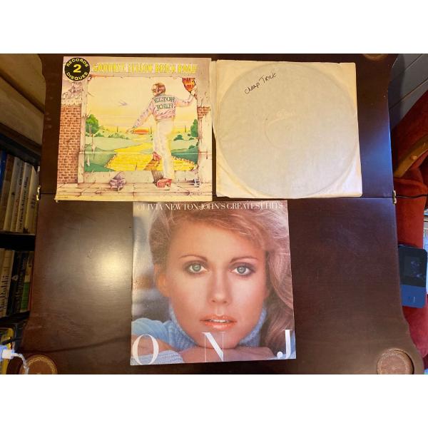 Records: Elton John, Olivia Newton John and Cheap Trick
