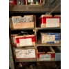 Image 2 : Several labelled boxes with plastic hoses trailer bearings door hardware, pulleys, and irrigation, s