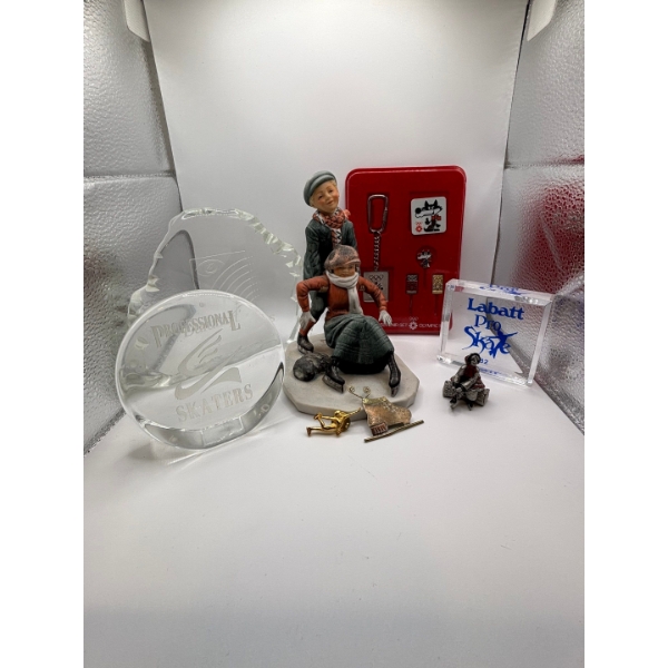 skating collectables and 1984 Olympic souvenir set with a Labat pro skate 82 and a sculpture inspire