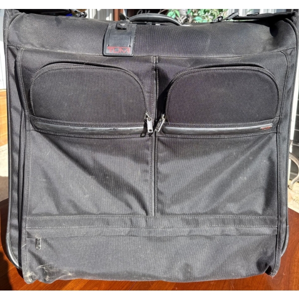 Luxury Luggage On Casters - TUMI - Travel First Class In Style 