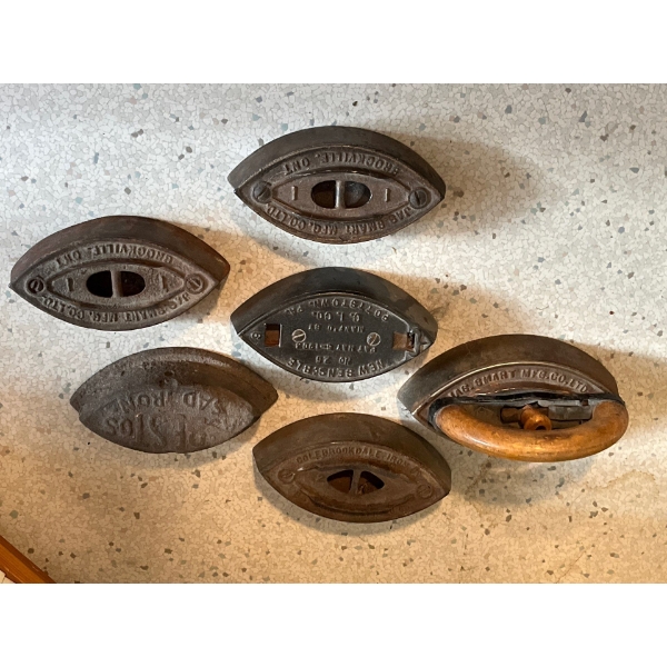 Collection of various cast-iron antique irons from several different manufacturers six in total.