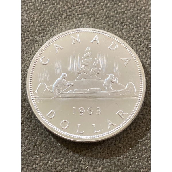 1963 Canadian Silver Dollar Coin Featuring Voyageur Design