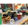 Image 2 : ceramic cups bowls, vases, and a couple of paintings