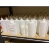 Image 8 : Storage Shelf With Contents Including Plastic Bottles, Nails, and Tools