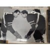 Image 5 : Black-and-White Hockey-Themed Film Stills on Display Boards
