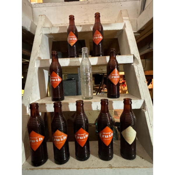ORANGE CRUSH vintage bottle collection 9 Amber bottles and one clear bottle all in amazing condition