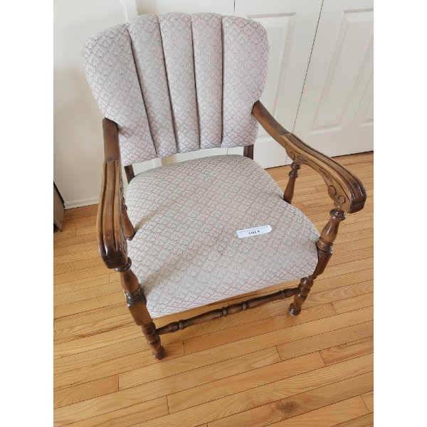 Upholstered Chair with Wood Frame and Carved Arm Details