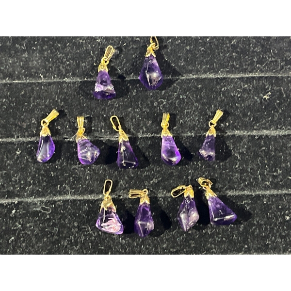 Collection of 11 Purple Stone Pendants