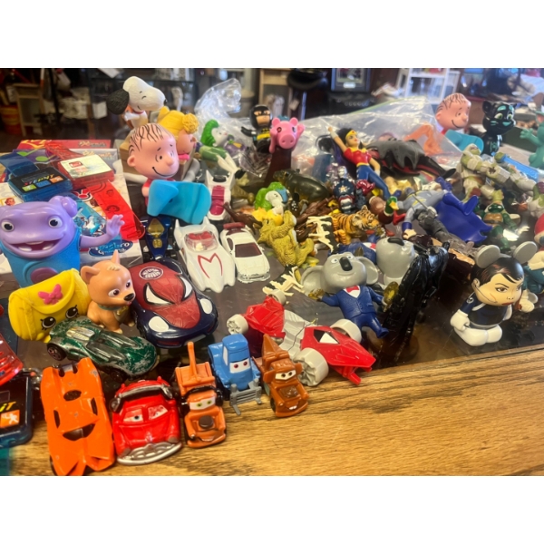  Huge assortment of new toys ranging From vintage Smurf collection, ninja turtle, Batman, Superwoman