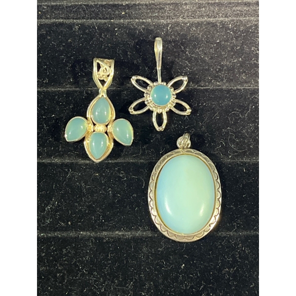Collection of Light Blue Stone Pendants