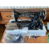 Image 2 : Vintage Portable Electric Sewing Machine with Leather Patches, Thread, and Accessories