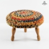 Image 2 :  Vintage Footstool Featuring A Colorful, Woven Rug-Style Top With Textured Pile And Three  Wood Legs
