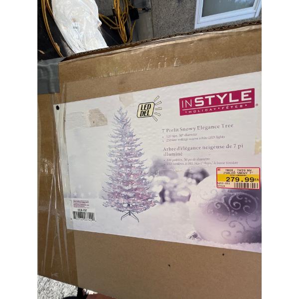  7 foot snowy elegance Christmas tree with decorations
