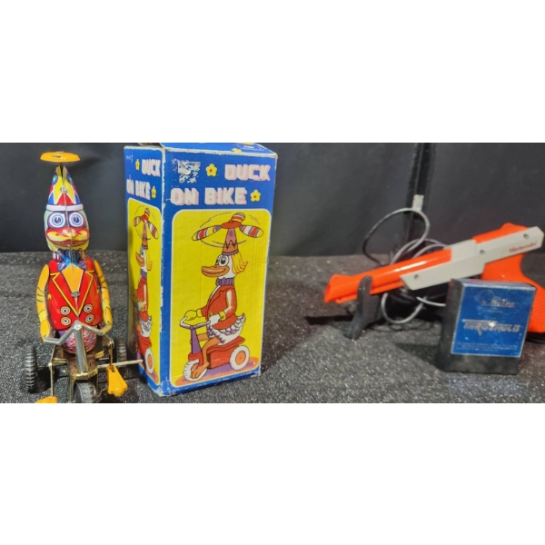 1980's Duck On a Bike Wind Up Toy with Nintendo NES Zapper Gun and Game Cartridge