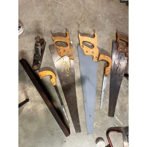 Assortment of Saws, wooden level, and vintage Stanley No. 113 Compass Plane
