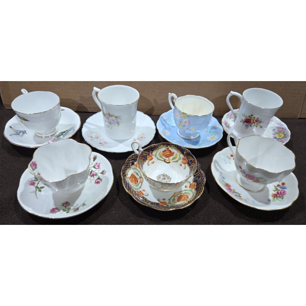 7 Teacups with Matching Saucers